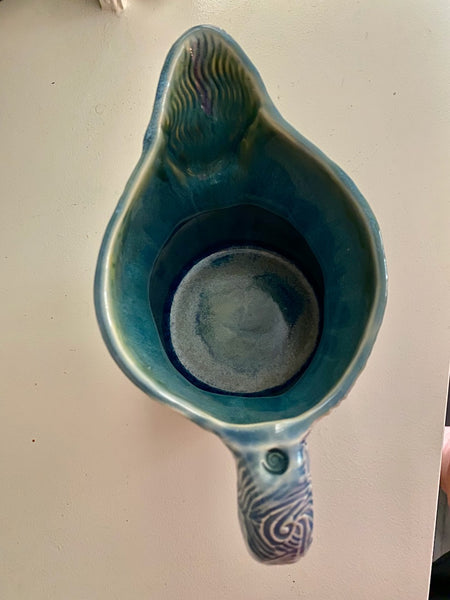 Pitcher